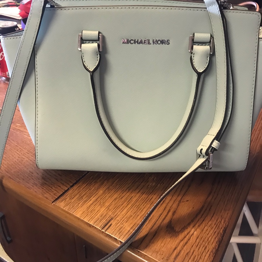Michael Kors mint purse with silver hardware